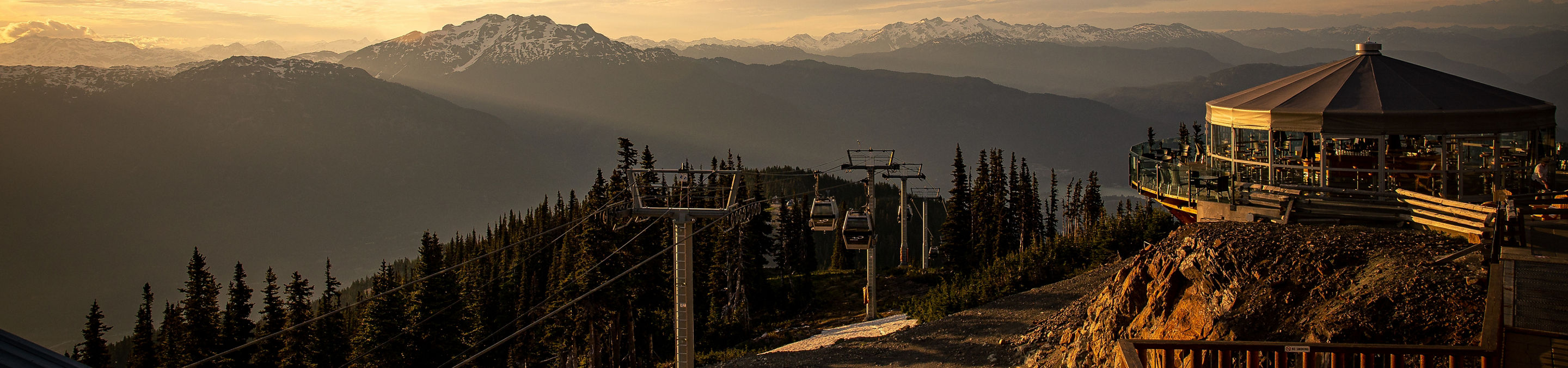 The Umbrella bar and Whistler Village Gondola at sunset