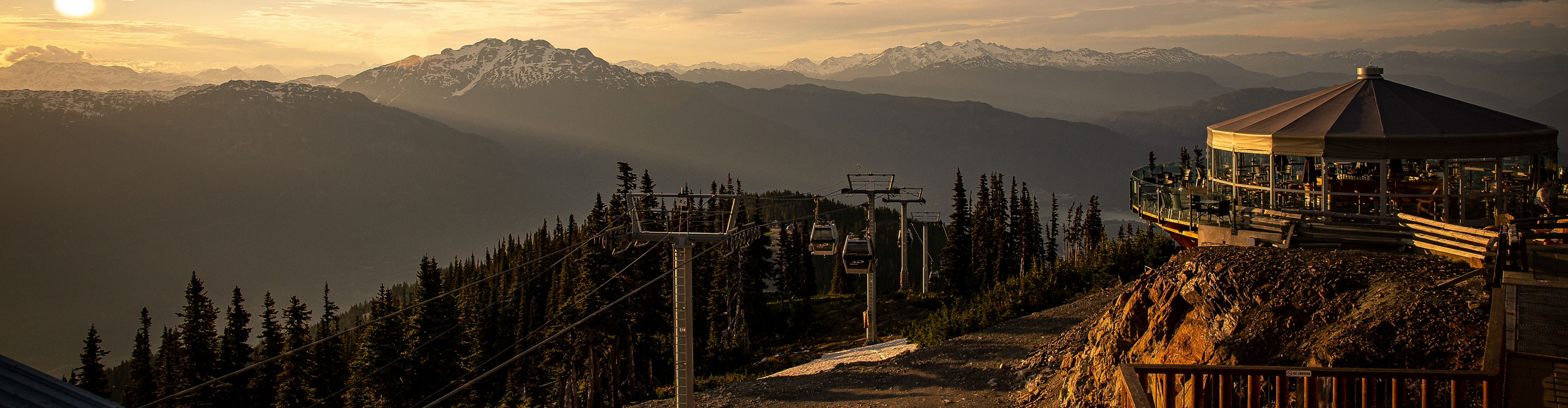 The Umbrella bar and Whistler Village Gondola at sunset