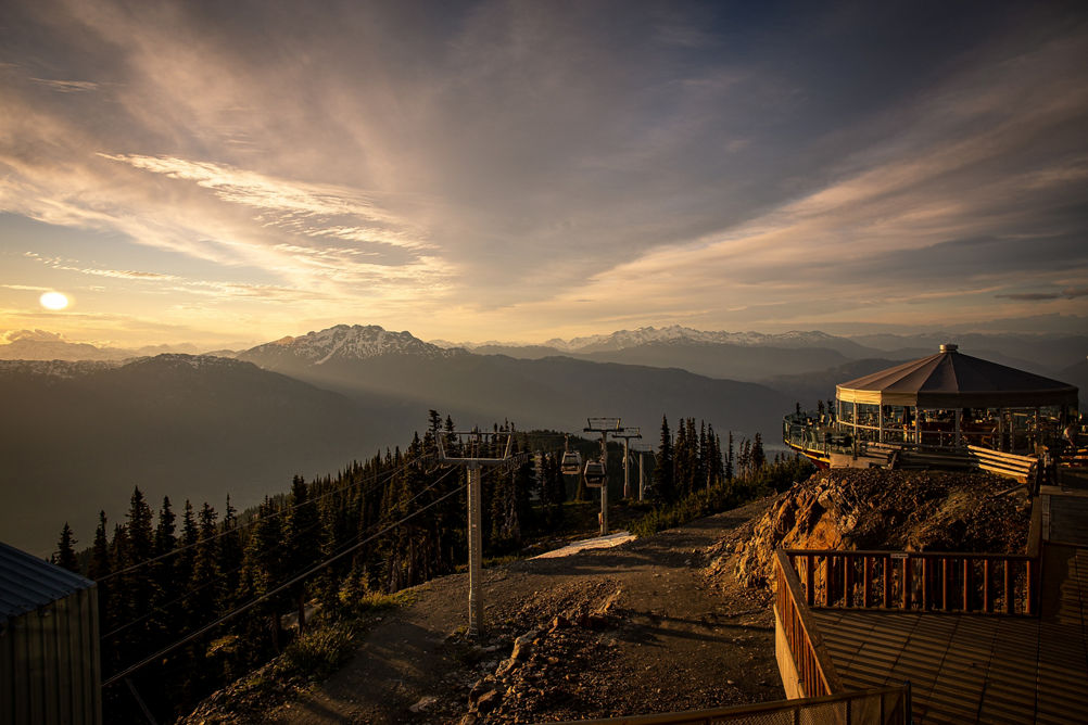 The Umbrella bar and Whistler Village Gondola at sunset