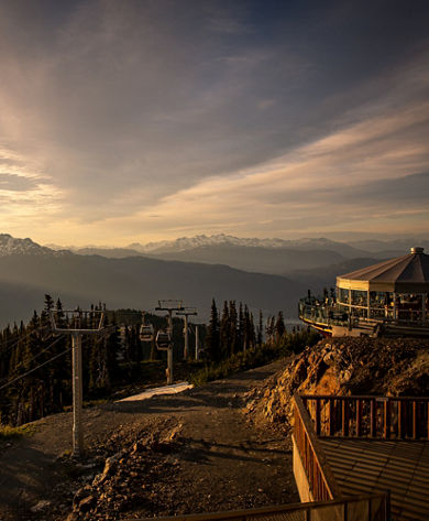 The Umbrella bar and Whistler Village Gondola at sunset