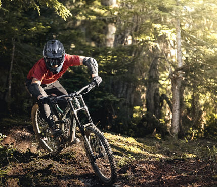 Paul riding down a fresh track in Creekside