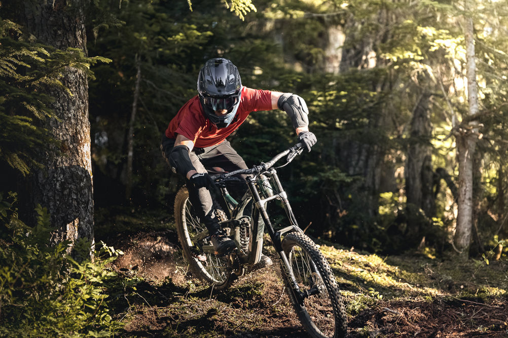 Paul riding down a fresh track in Creekside
