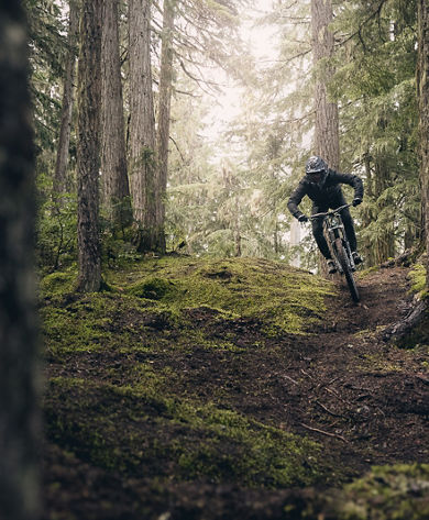 Mountain biking down loam in Creekside