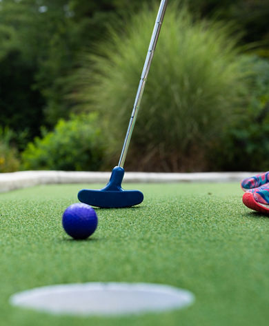 Family Plays Mini Golf at Mount Sunapee