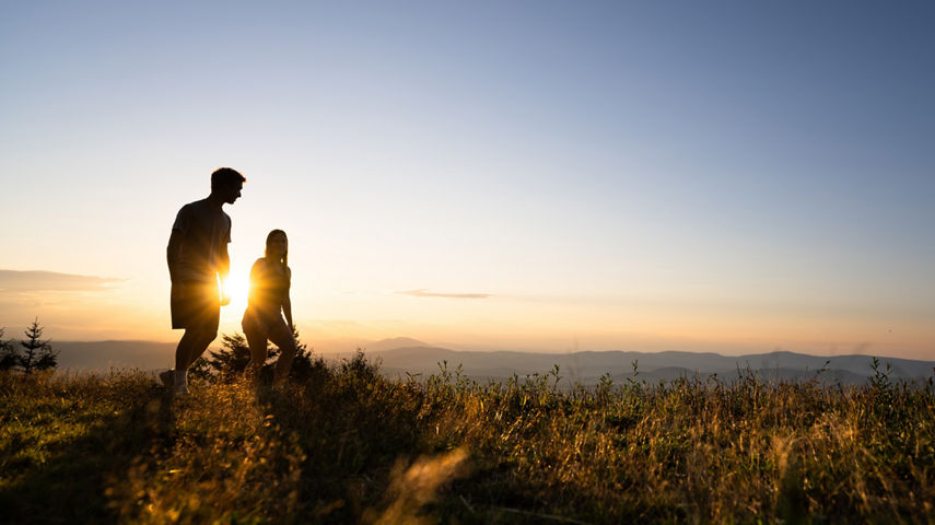 Young Couple Hiking at Mount Sunapee