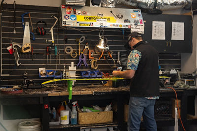 Employee Tunes Up Gear at Crested Butte Mountain Resort Tuning & Repair Shop