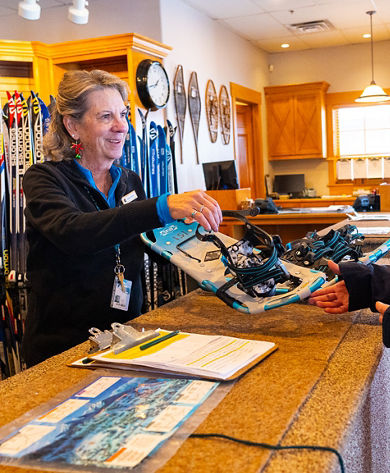Employee Checking Out Gear at Nordic Center in Keystone