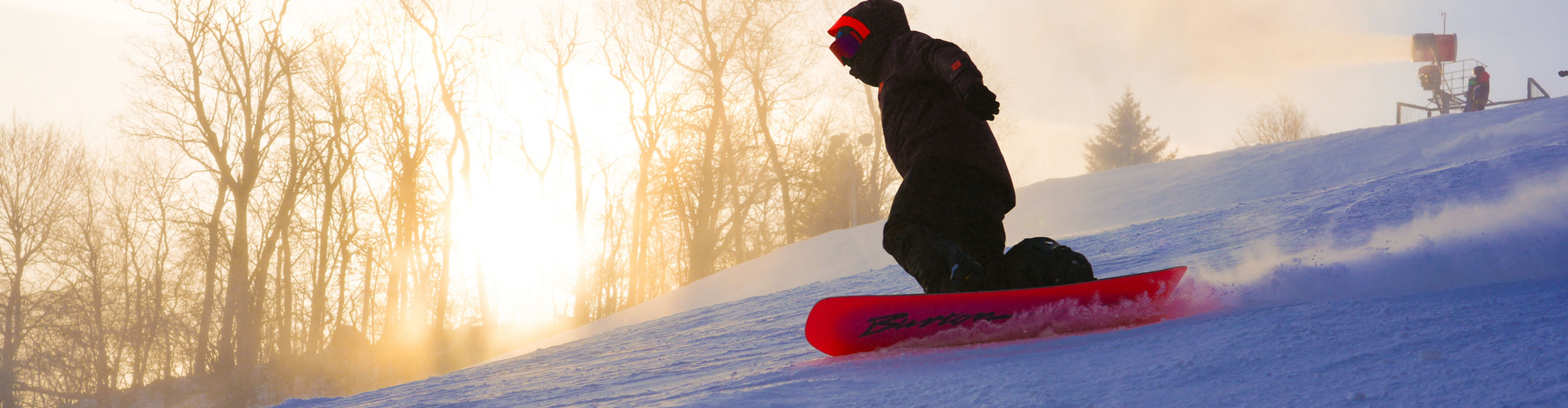 Snowboarder Carves Across Mountain at Roundtop
