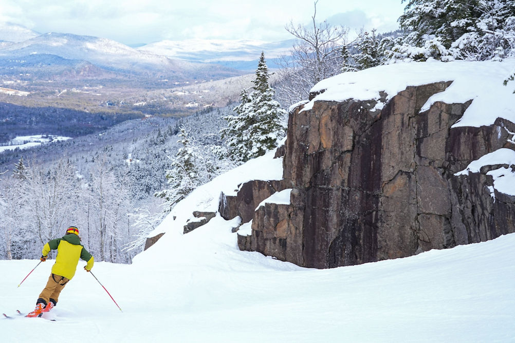 Skier Descends Mountain at Attitash