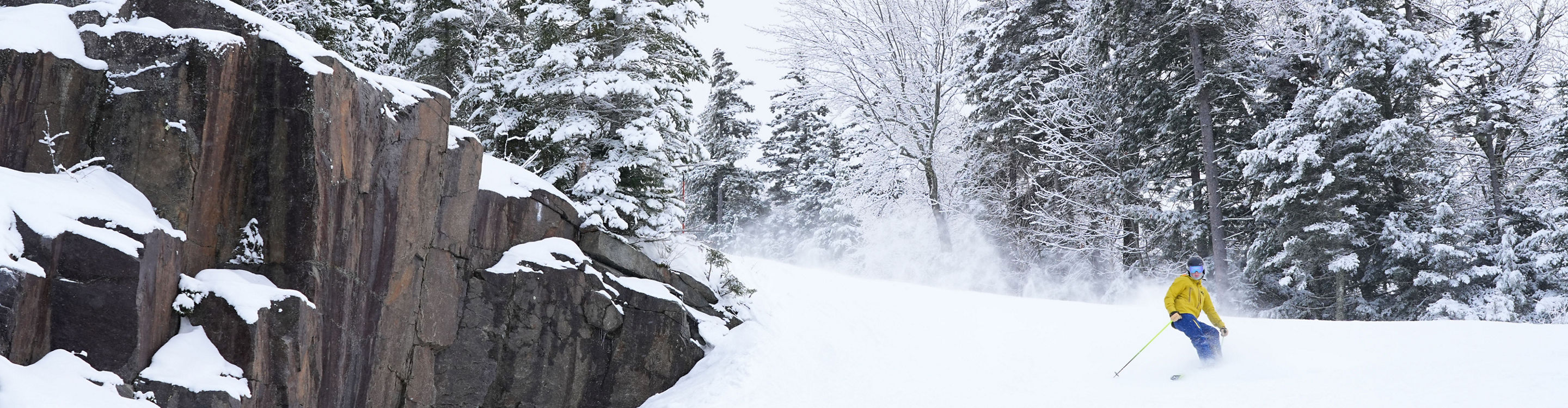 Skier Rides in Hazy Winter Weather at Attitash