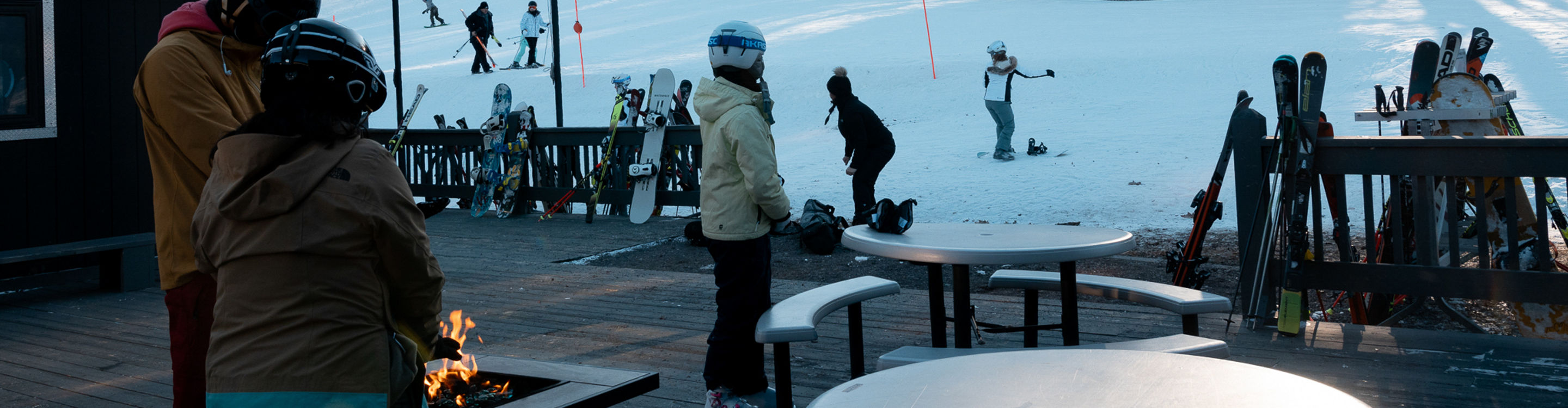 Resort Guests Gather Around Snowy Base Area at Jack Frost Big Boulder