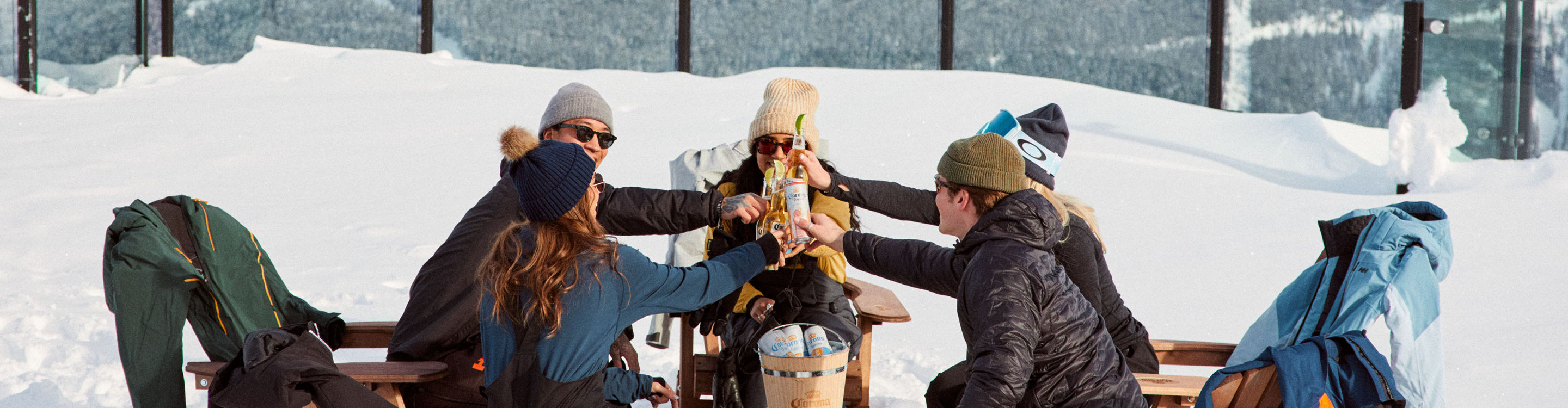 A Group of Friends Enjoy a Corona at Whistler Blackcomb