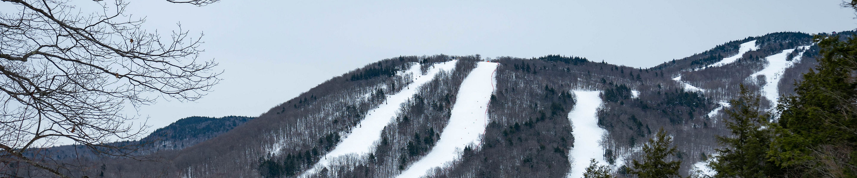 Scenic View of Snow Covered Runs at Mount Sunapee