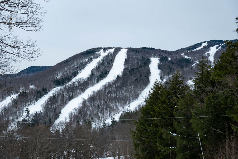 Scenic View of Snow Covered Runs at Mount Sunapee