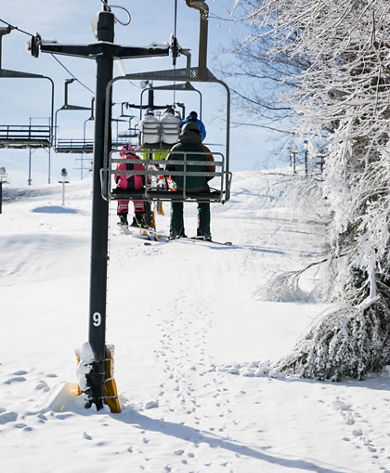 Resort Guests Ride Chairlift at Paoli Peaks