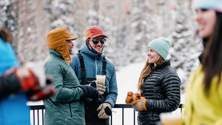 Group of Friends Enjoying Apres on the Balcony of Mid Mountain at Park City