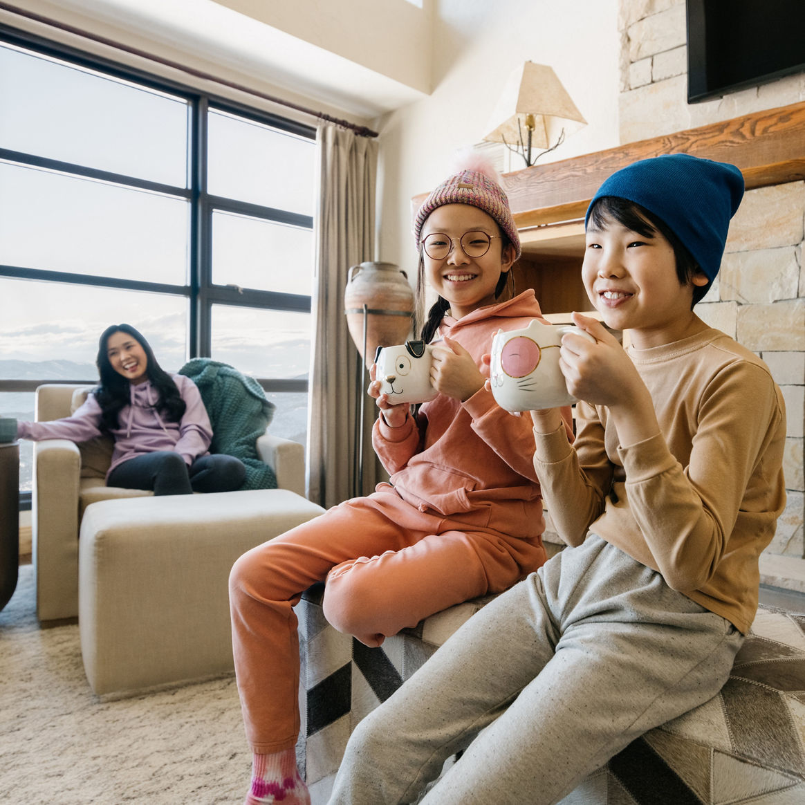 Family Enjoys Leisure Time Inside Their Unit at Grand Summit Lodging at Park City