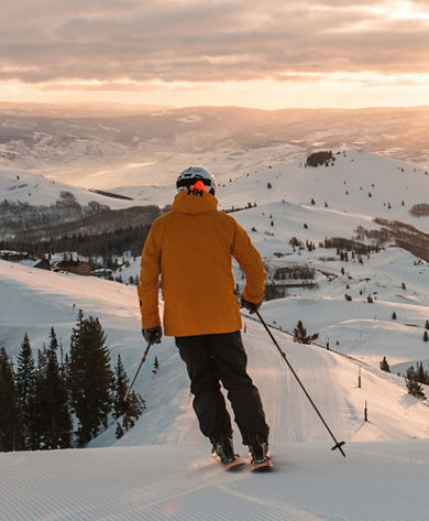 Skier and Snowboarder Hit a Trail During Sunrise at Park City