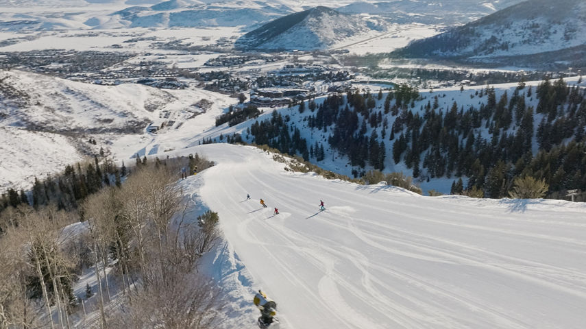 Aerial Shot of Skiers Skiing Down a Trail at Park City