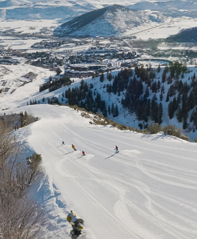 Aerial Shot of Skiers Skiing Down a Trail at Park City
