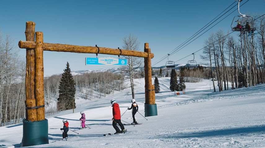 Family Skies Through McCoy Park Arch at Beaver Creek