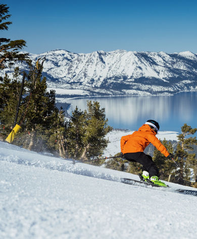 Skier Hits a Run at Heavenly with a Scenic View of Lake Tahoe in the Background