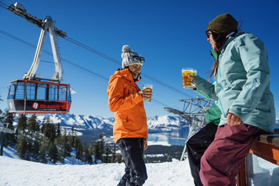 Resort Guests Enjoy a Beer from Tamarack Lodge at Heavenly