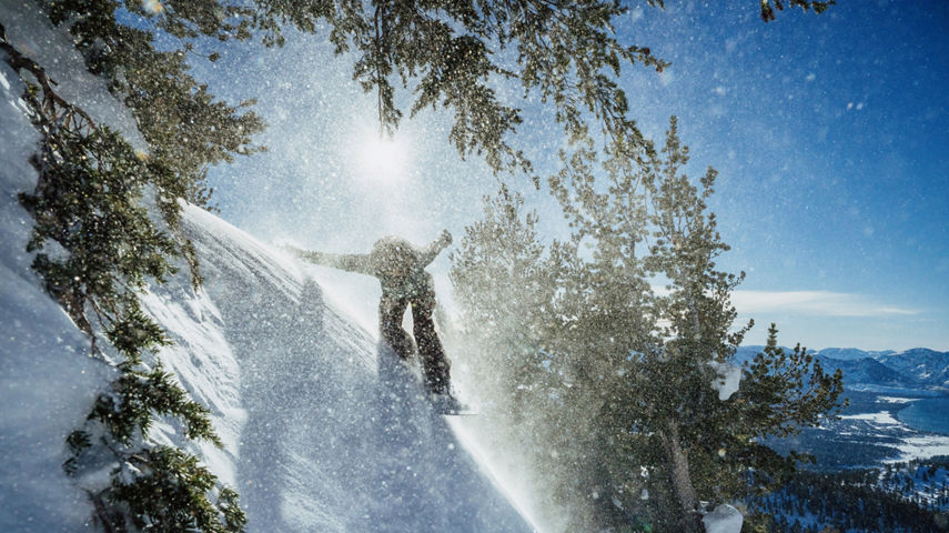 Snowboarder Leaps Off Advanced Terrain Ledge at Heavenly