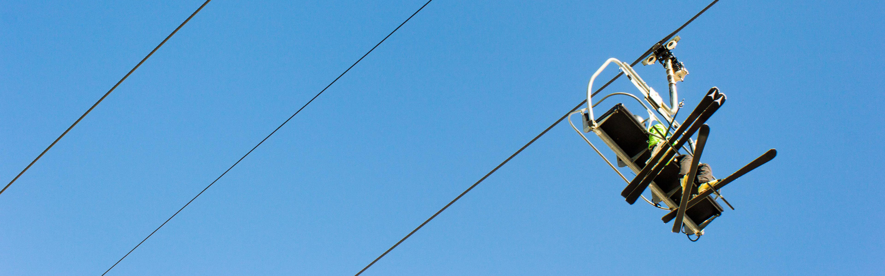 Friends Riding Chairlift at Crested Butte