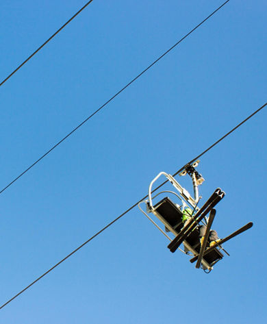 Friends Riding Chairlift at Crested Butte