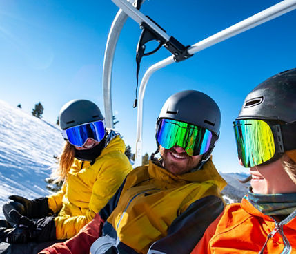 Friends Riding Chairlift at Crested Butte