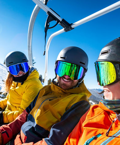 Friends Riding Chairlift at Crested Butte