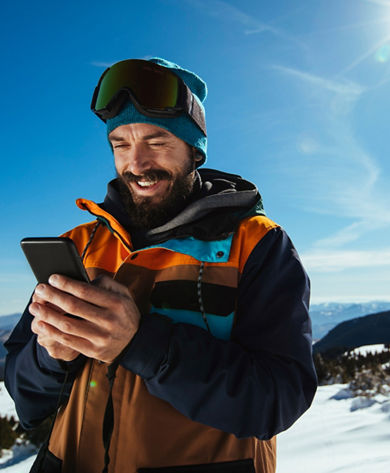 Man Looking at Apollo App at Crested Butte