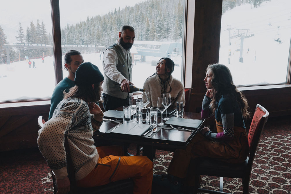 Friends Being Served Wine at Vail