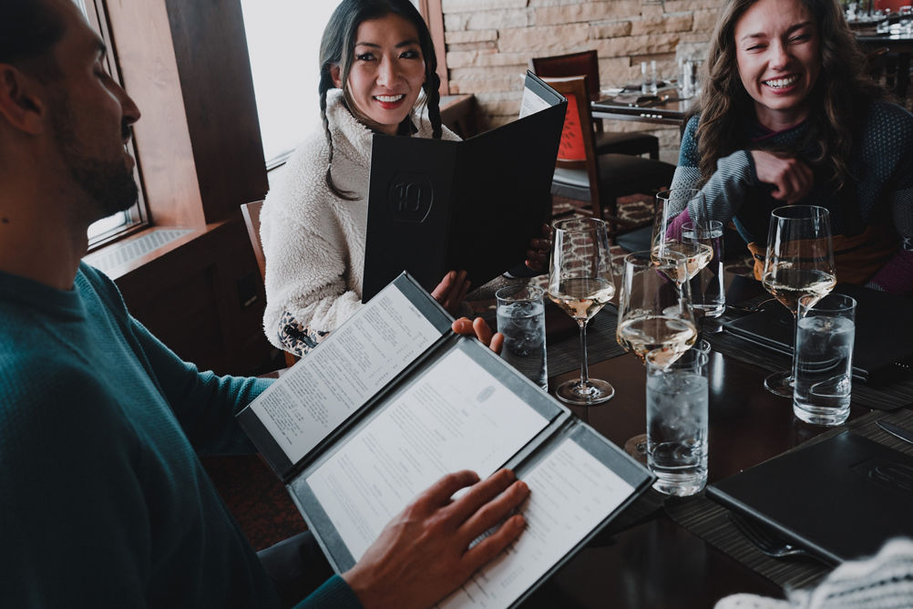 Friends Enjoying Lunch After a Day of Skiing at Vail