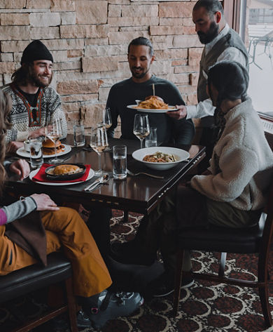 Friends Being Served Lunch at Vail