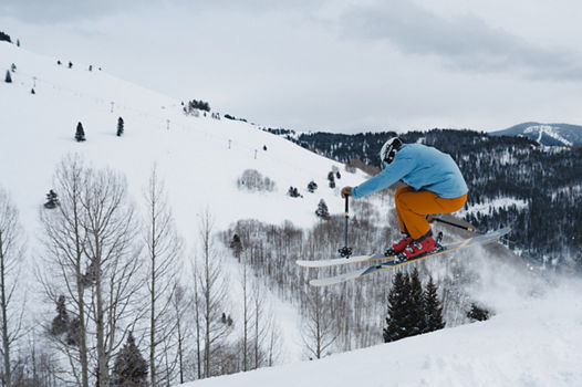 Skier Does a Jump Trick on Advanced Terrain at Vail