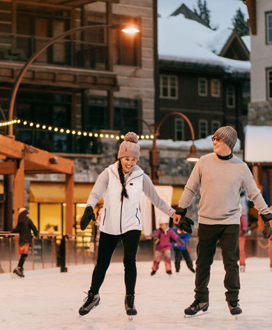 Couple Enjoys Holding Hands Ice Skating at Northstar