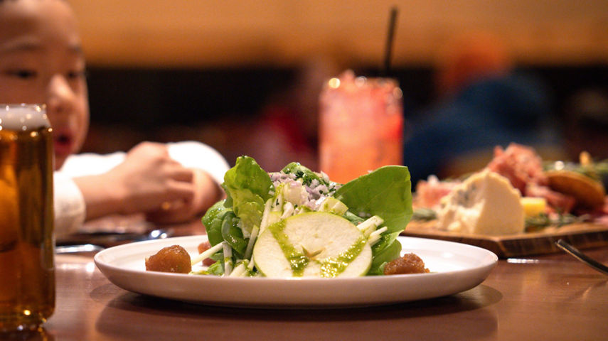Family Enjoys Eating Appetizers at Wild Pine Restaurant at Northstar