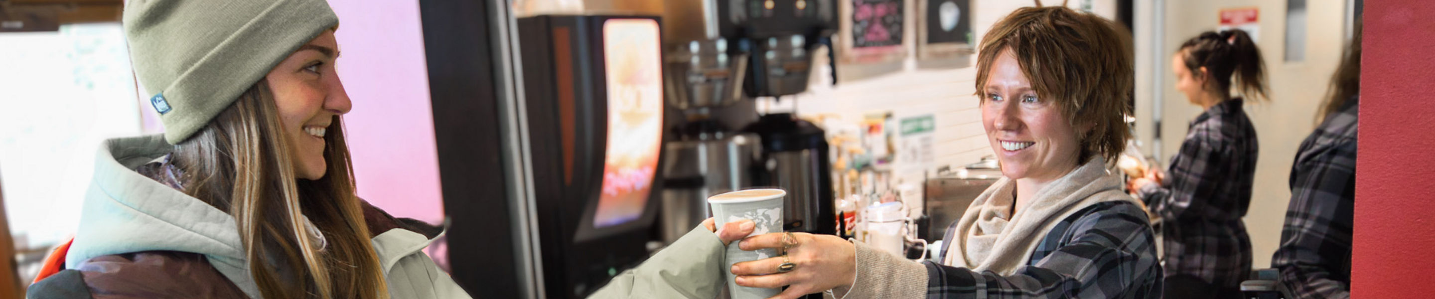 Resort Guest Picks Up Order from Counter at T-Bar at Stevens Pass
