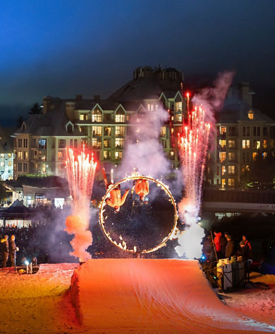 Two Skiers Do Backflip Through Flaming Hoop at Fire and Ice Event Hosted by Whistler Blackcomb