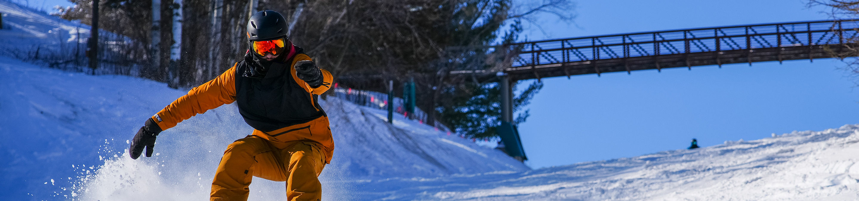 Snowboarder Makes Turn on Mountain at Afton Alps