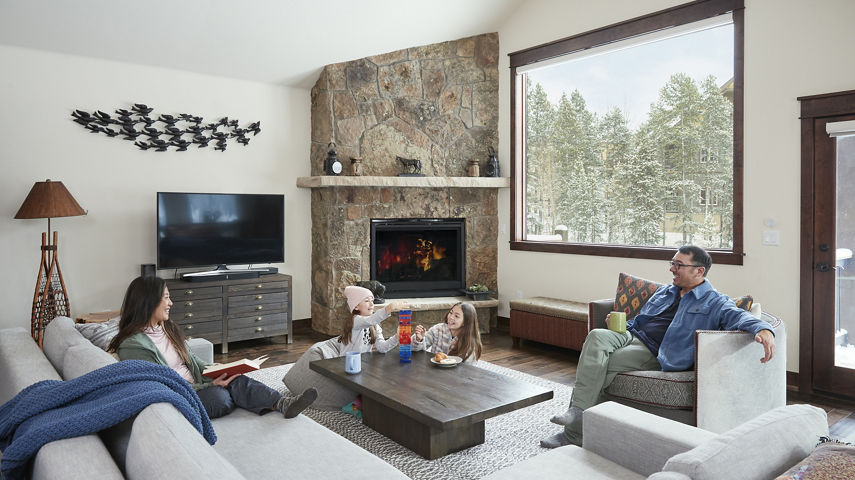Family Enjoys Downtime Inside Their Unit at River Run Townhomes at Keystone