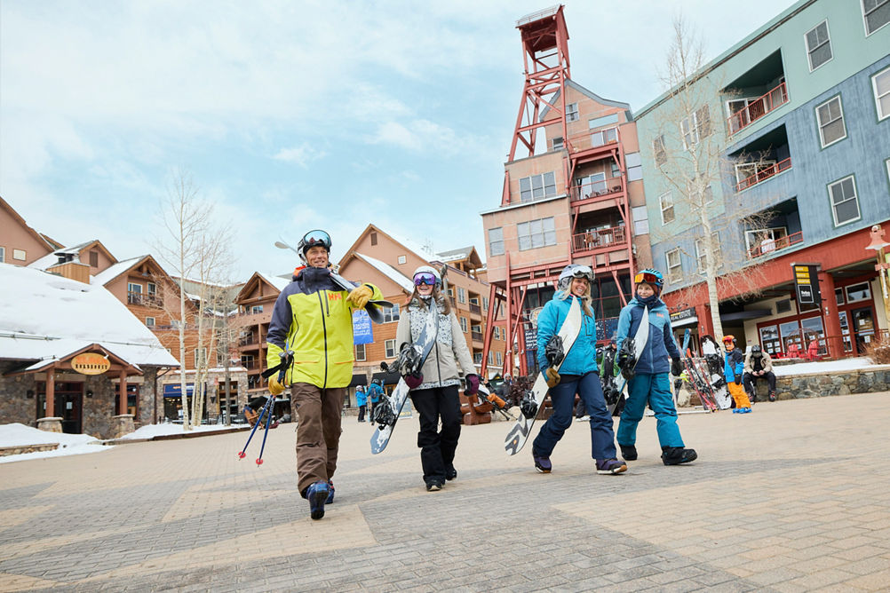 Family Walks Through the Keystone Resort Village with Their Gear