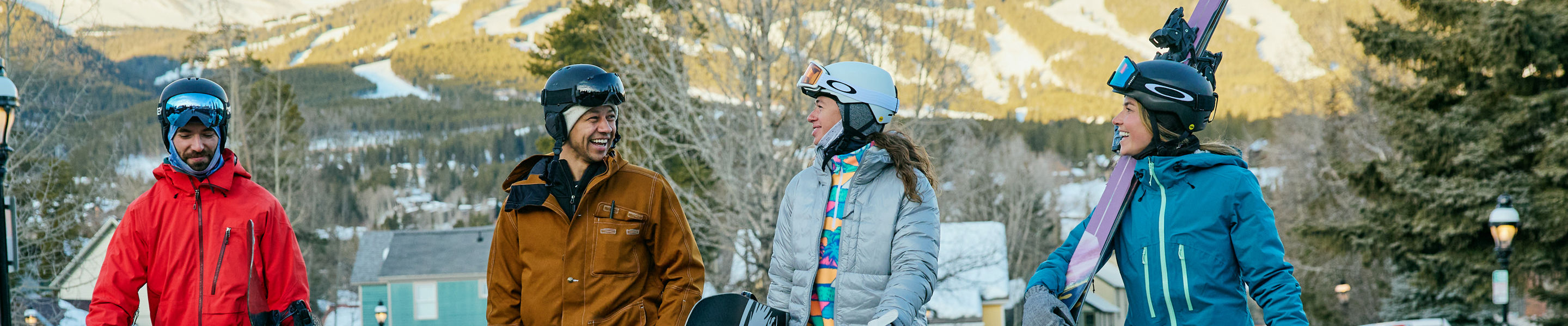 Group of Friends Walk Through the Town of Breckenridge with Gear