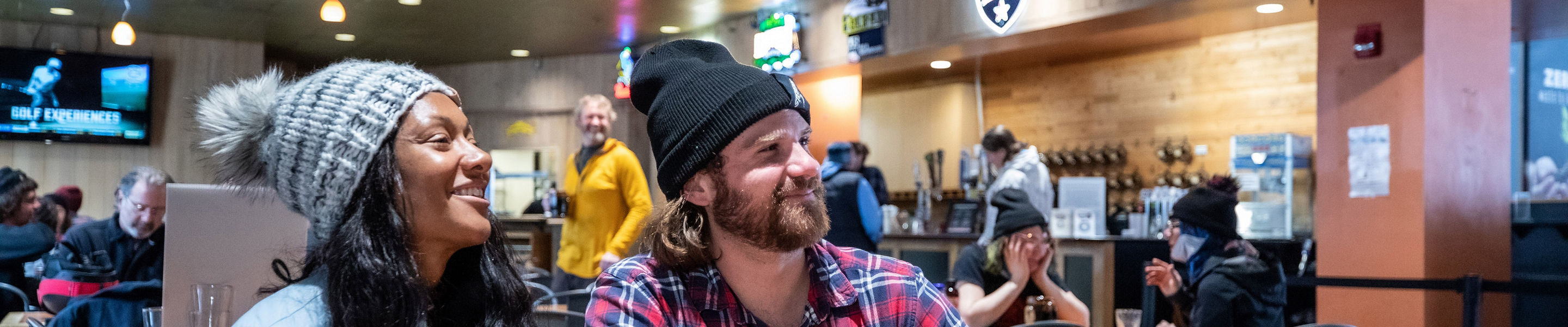 Couple Enjoys Apres at Foggy Goggle at Stevens Pass