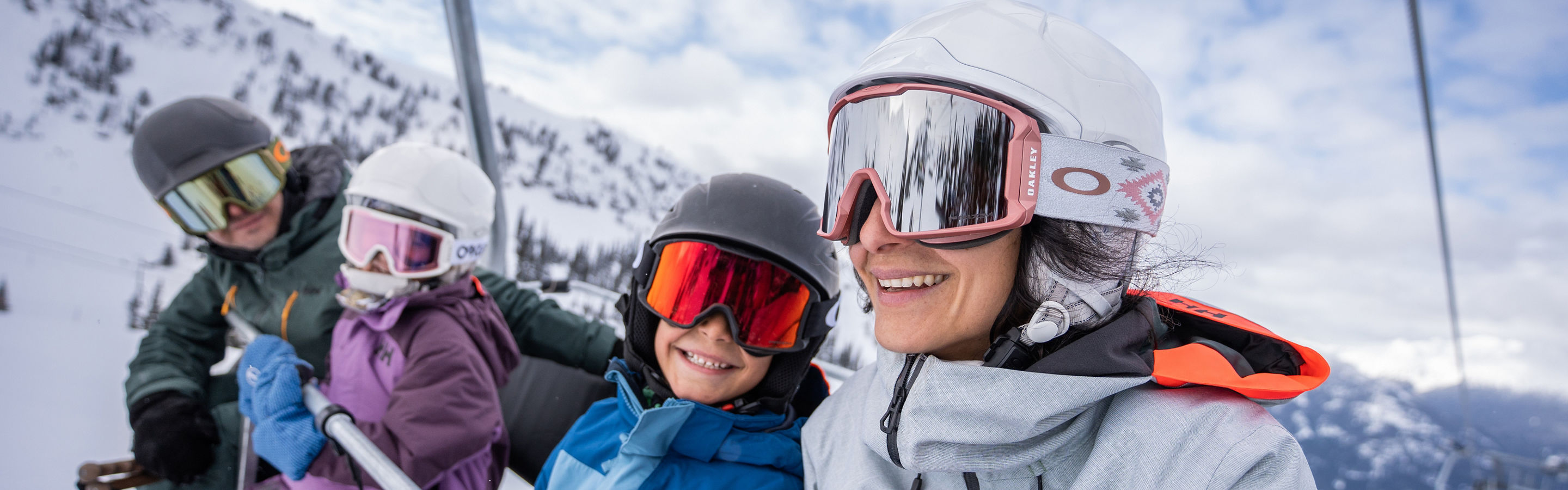 Family Rides 5-Person Chairlift at Whistler Blackcomb