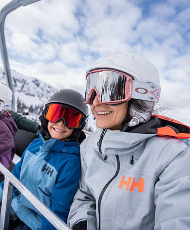 Family Rides 5-Person Chairlift at Whistler Blackcomb