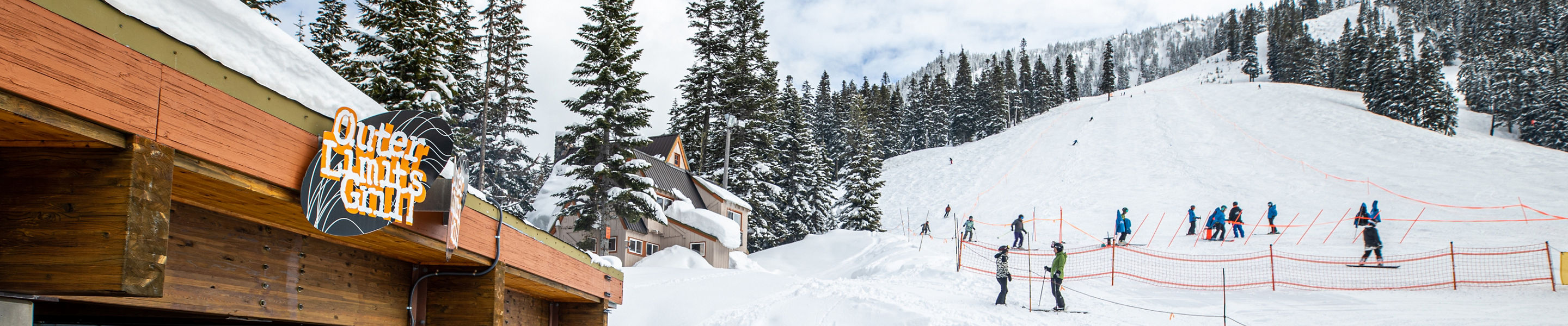 Ski Gear Resting Outside of Outer Limits at Stevens Pass