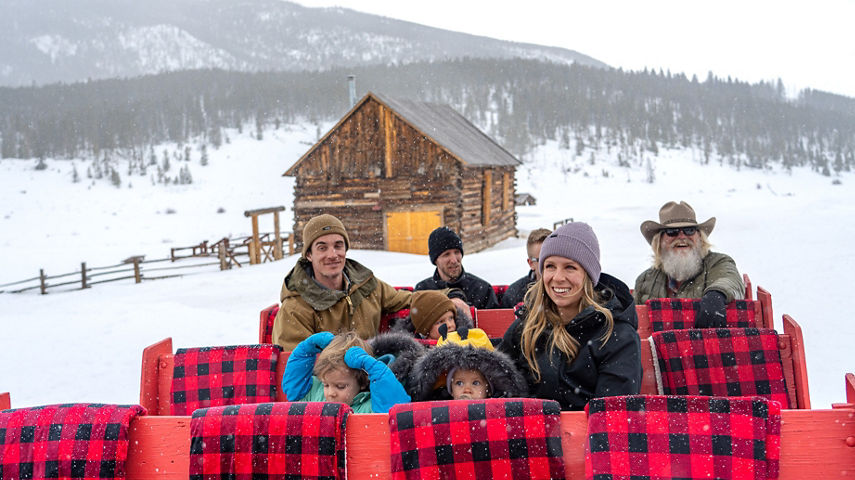 Family Enjoying Sleigh Ride through Keystone Resort